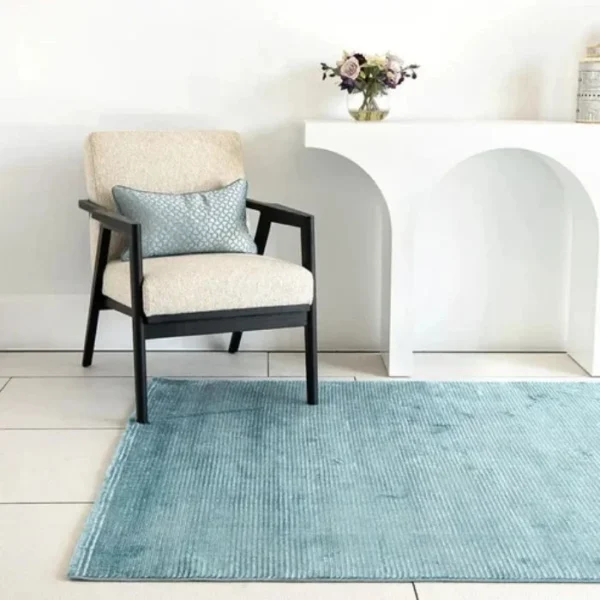 Modern turquoise striped rug