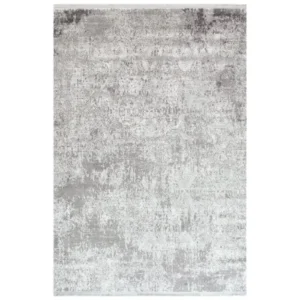 Irregular diamond patterned rug in muted shades