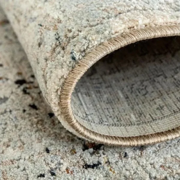 Beige grey rug with modern distressed look