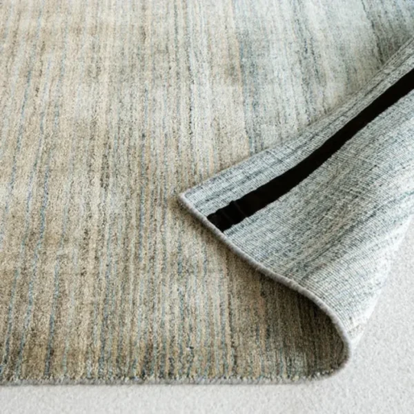 Ombre patterned rug enhancing modern living room