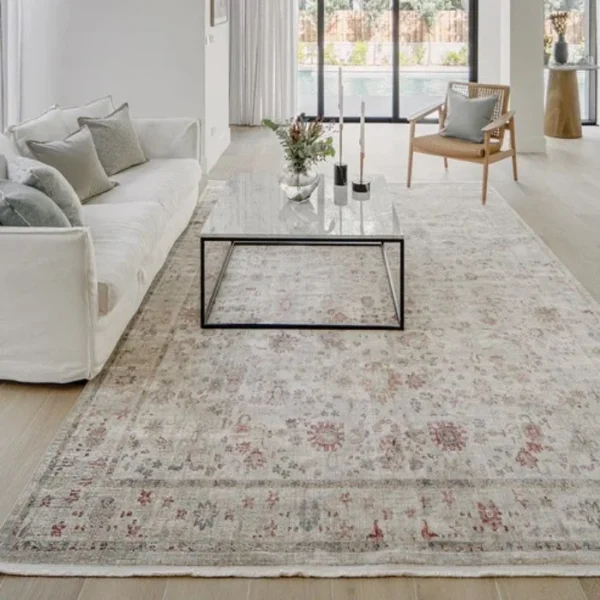 Vintage rug featuring ornate central medallion