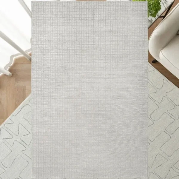 Top view of modernist grid rug pattern