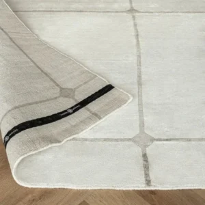 Large grid patterned rug in beige