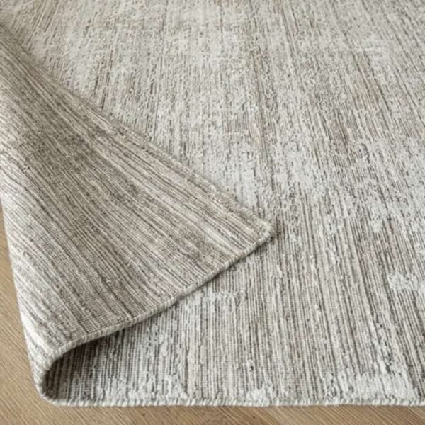 Rug with pottery-inspired textured design