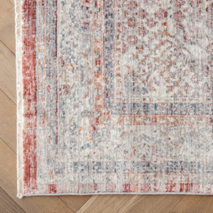 Red area rug with distressed texture