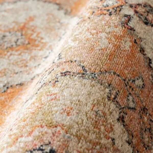 Area rug with repeating diamond design