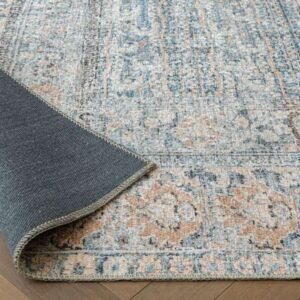 Faded rug with repeating medallion design