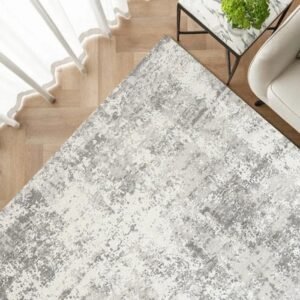 Abstract grey rug styled in modern room
