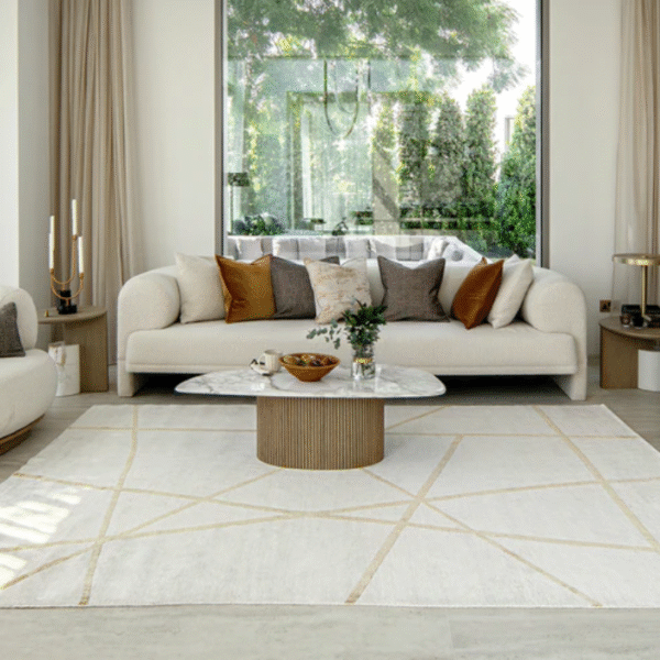 Gold rug styled in living area