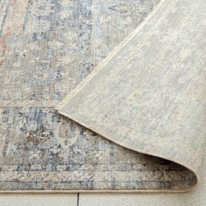 Rustic distressed beige rug