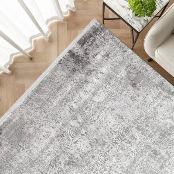 Modern rug with scattered diamond shapes