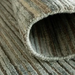 Textured rug with narrow parallel lines