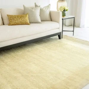 Soft textured gold rug with mesh effect