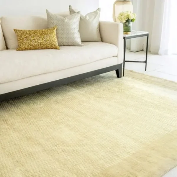 Soft textured gold rug with mesh effect