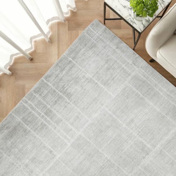 Grey line rug in dining room
