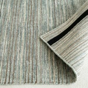 Area rug with narrow textured stripe pattern