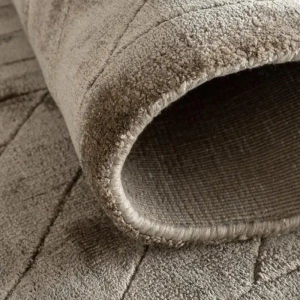 Textured taupe line pattern rug