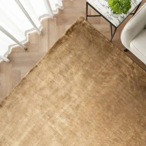 Textured solid gold rug