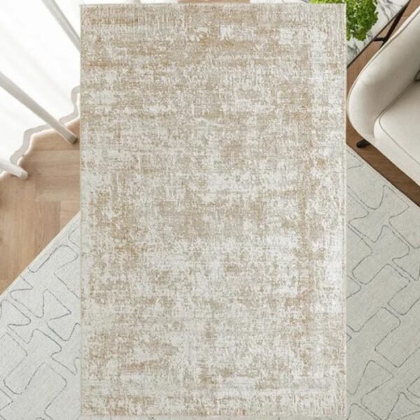 Overhead view of faded abstract rug