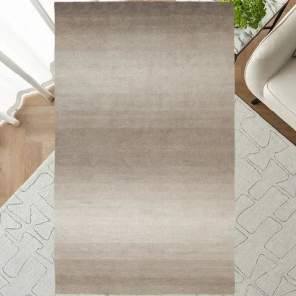 Top view of solid shaded ombré rug