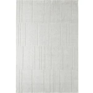 Light grey rug featuring tufted linework