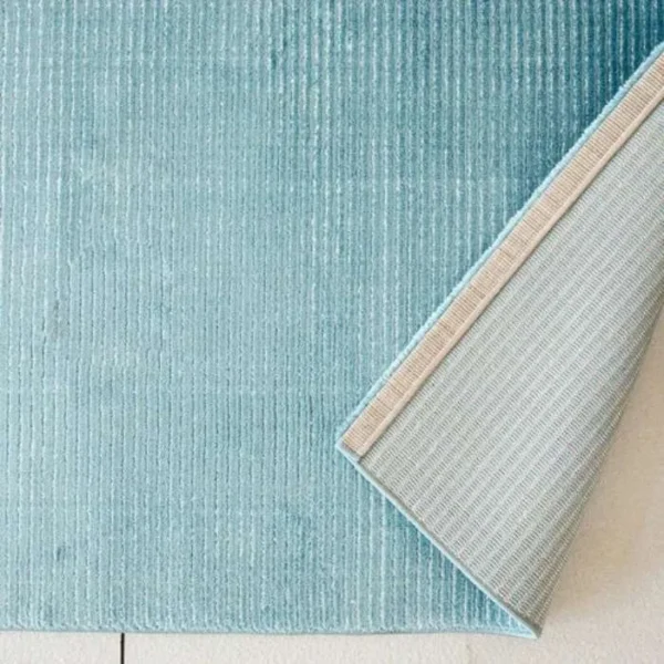 Turquoise striped rug texture