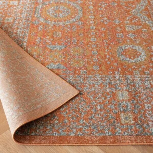 Faded traditional medallion rug design