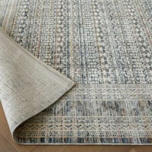 Faded traditional patterned rug design