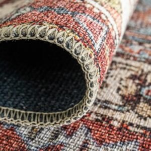 Ornate ceramic style patterned rug