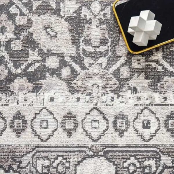 Soft grey tribal rug with vintage shading