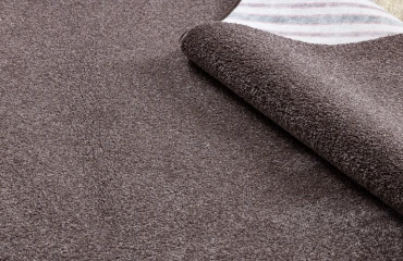 Modern brown carpet installation Dubai homes
