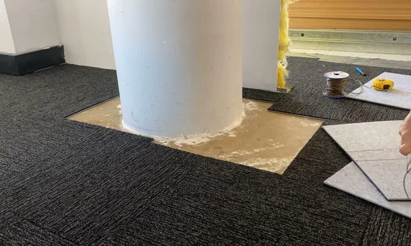 cutting carpet tiles